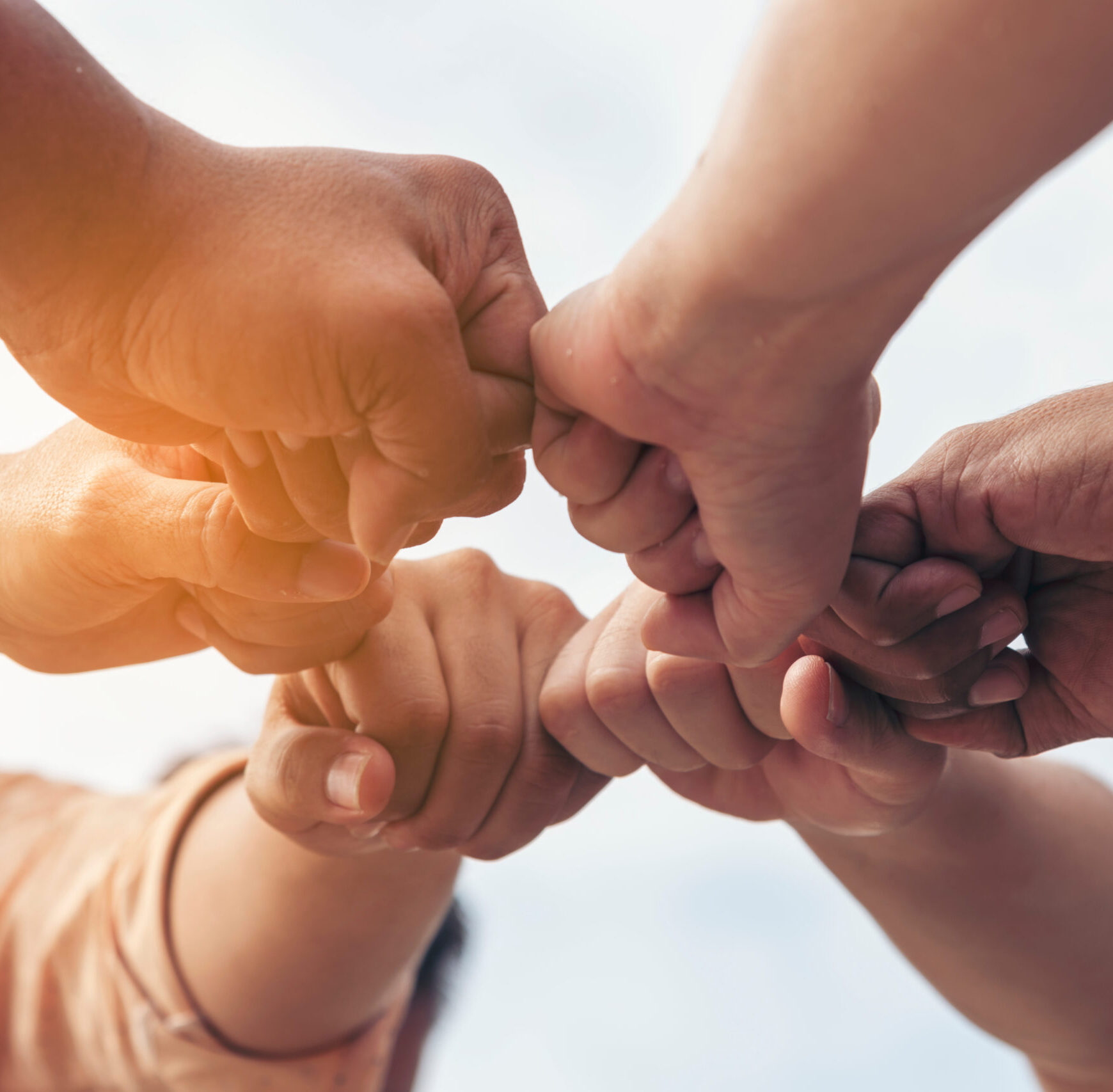 Close up hands Teamwork group of multi racial people meeting join hands. Diversity people hands join empower partnership teams connect volunteer community. Diverse multiethnic Partners team together